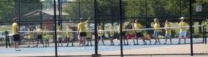 This drill featured 16 people at the net with racquets eager to hit volleys. 